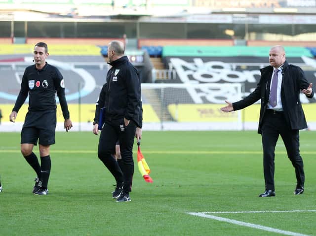 Sean Dyche gets a point across to the referee at half-time