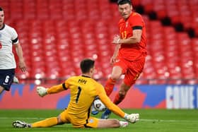 Nick Pope saves from Keiffer Moore against Wales at Wembley
