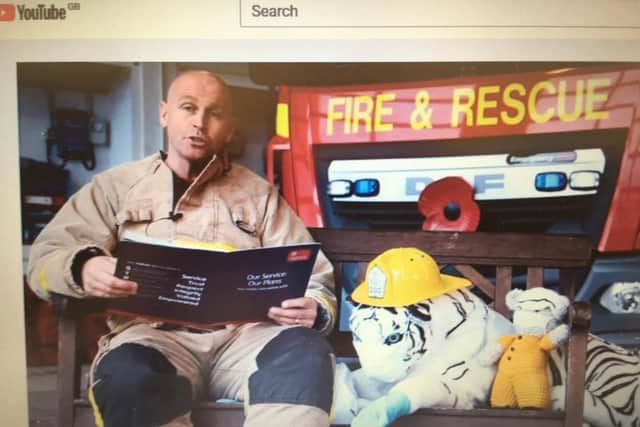 Firefighter Lee Clough reads a Bonfire Night bedtime story to encourage families to keep safe if they are celebrating the event this weekend.