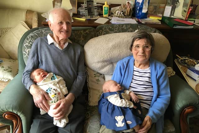 Bob and Gladys Baines with two of their great-grandchildren