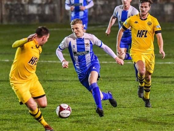 Winger Jake Connelly in action for Clitheroe FC