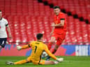 Nick Pope makes a save against Wales