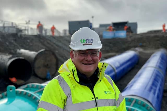 Project director John Hilton with some of the new blue pipes which were connected into the Haweswater Aqueduct this month. The old pipes can be seen behind him to the left