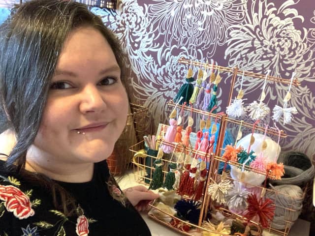 Elle Toye with some of the hand-made bows she makes for her business Rustic Wrapping