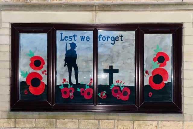 Stuart and Lisa's fantastic poppy window display they created for Remembrance Sunday