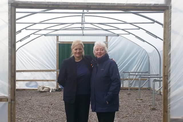 Tesco community champion Billie-Jean Horne (left) with Ida Carmichael, who has described her as a major asset to the Friends of Ightenhill Park group.