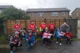 The charity bike riders at the beginning of the challenge