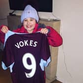 Nadia Sattar proudly shows off the shirt Sam Vokes presented to her