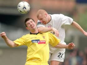 Sean Dyche, in his Millwall days, beats former Claret Alan Lee in the air