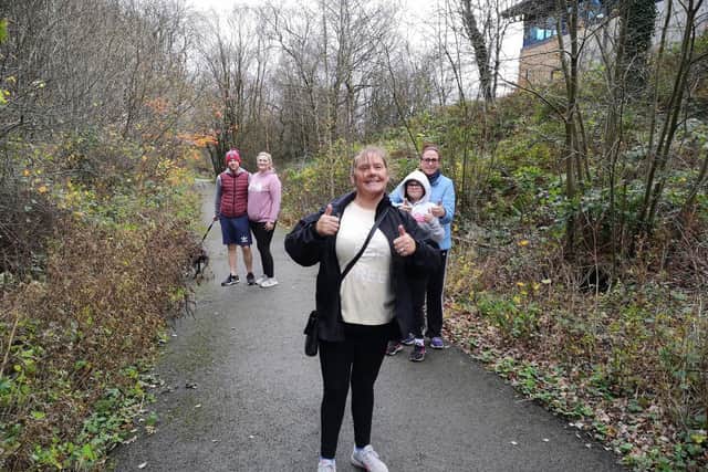 Vivien is joined on one of her training walks by  Layla Boult and Lee Ormerod (left)  and Angela Southworth and her daughter Hannah