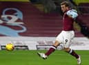 Burnley's New Zealand striker Chris Wood shoots to score the opening goal of the English Premier League football match between Burnley and Crystal Palace at Turf Moor in Burnley, north west England on November 23, 2020.