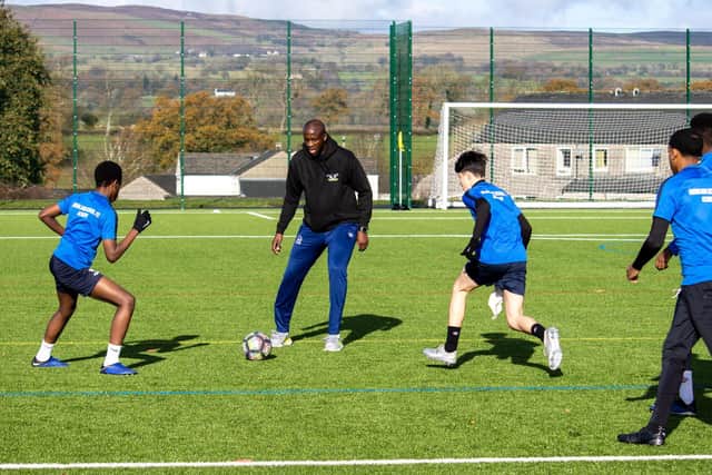 Yaya Toure puts pupils through their paces at Moorland School in Clitheroe