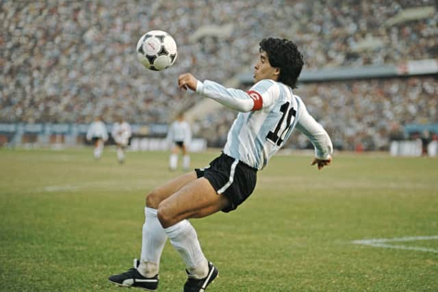 Argentina player Diego Maradona in action during a 1986 FIFA World Cup qualifying match against Peru at the National Stadium on June 23, 1985 in Lima, Peru.
