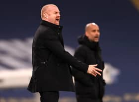 Burnley boss Sean Dyche and Manchester City manager Pep Guardiola at the Etihad Stadium