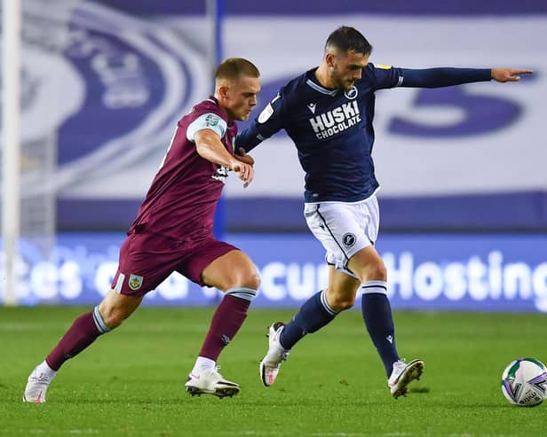 Josh Benson of Burnley battles for possession with Troy Parrott of Millwall during the Carabao Cup third round match between Millwall and Burnley at The Den on September 23, 2020 in London, England.