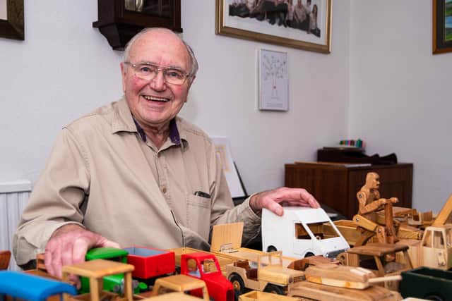 Talented craftsman Mr Bill Gregson with his selection of handmade toys