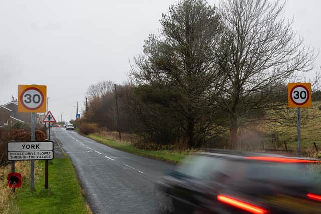 Residents are asking motorists to stick to the speed limit when travelling through the village