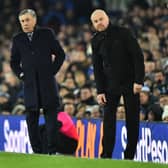Everton Manager, Carlo Ancelotti (L) and Burnley Manager, Sean Dyche give their players instructions from the sidelines during the Premier League match between Everton FC and Burnley FC at Goodison Park on December 26, 2019 in Liverpool, United Kingdom.