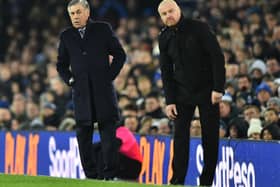 Everton Manager, Carlo Ancelotti (L) and Burnley Manager, Sean Dyche give their players instructions from the sidelines during the Premier League match between Everton FC and Burnley FC at Goodison Park on December 26, 2019 in Liverpool, United Kingdom.