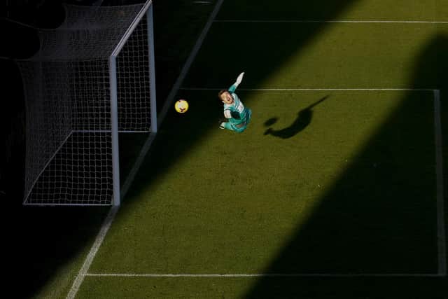 Nick Pope of Burnley dives in an attempt to make a save during the Premier League match between Burnley and Everton at Turf Moor on December 05, 2020 in Burnley, England.