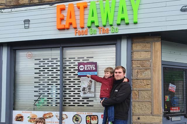 Luke Nixon, of Burnley Eats, with his son Ethan (six) and daughter Edith who is two