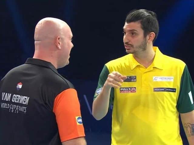 Diogo Portela (right) with world number-one Michael van Gerwen