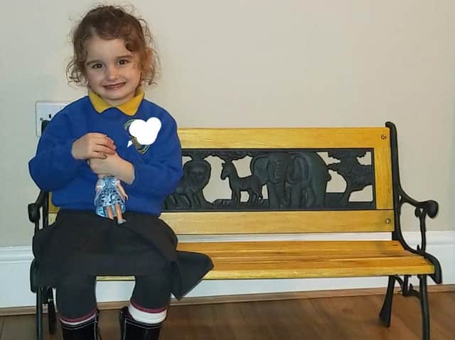 All smiles - Kailey over the moon with her new bench