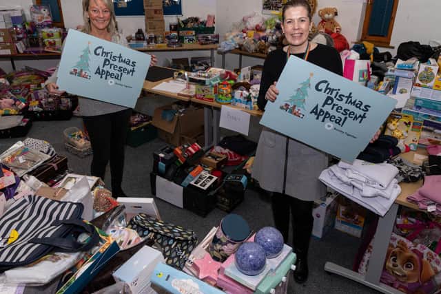 Pictured with some of the gifts donated to the appeal are Alicia Foley who is Community Investment Manager at Calico Homes (right) and  Lynne Blackburn who is Project Manager at Participation Works.