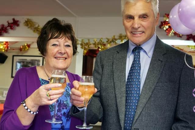 A champagne toast for devoted couple Walter and Alma Stafford who have celebrated their 60th wedding anniversary (photo by Carlton Young)