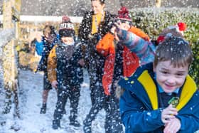 Pupils at Kirkland and Catterall St Helen's school enjoy the snow Photo: Kelvin Stuttard