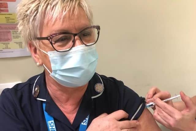 Burnley practice nurse Amanda Bellas, who has 45 years experience working for the NHS,is encouraging people to have the Covid-19 vaccination.