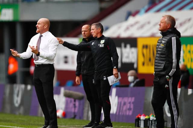 Sean Dyche, Manager of Burnley gives his team instructions during the Premier League match between Burnley FC and Sheffield United at Turf Moor on July 05, 2020 in Burnley, England.