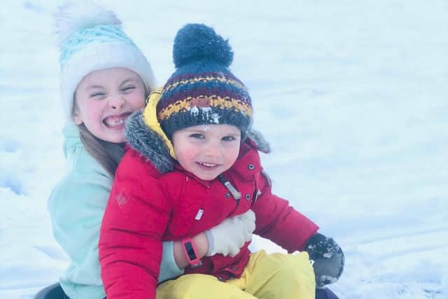 The arrival of snow overnight meant just one thing for Burnley children Annie Bond (six) and her little brother Oliver who is two.. fun!