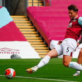 Burnley's English defender James Tarkowski scores the opening goal during the English Premier League football match between Burnley and Sheffield United at Turf Moor in Burnley, north west England on July 5, 2020.