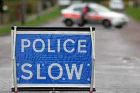 The A59 in Chatburn has been closed in both directions after a man's body was found on the carriageway