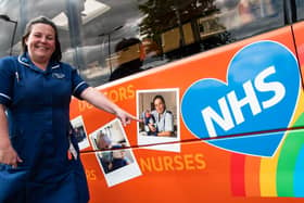 Burnley General Teaching Hospital midwife Rachel Magee-Thorpe with her own image on the side of The Burnley Bus Company’s ‘Burnley Heroes’ bus.
