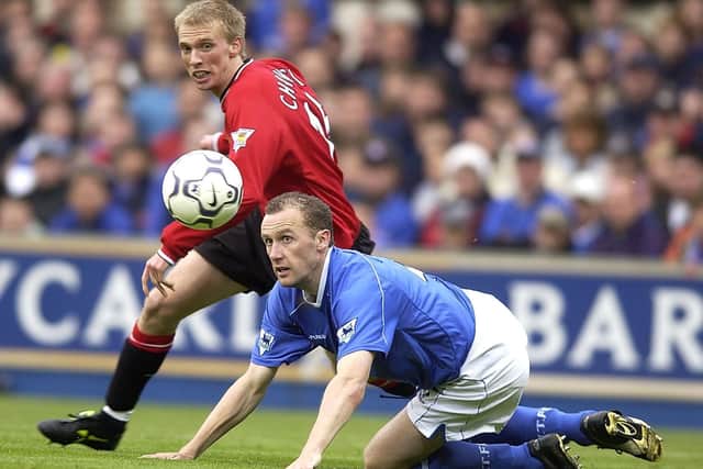 Luke Chadwick of United holds off John McGreal of Ipswich during the Barclaycard F.A. Premiership match between Ipswich Town v Manchester United at Portman Road, Ipswich.