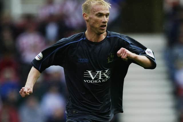 Luke Chadwick of Burnley running with the ball during the Nationwide League Division One match between Stoke City and Burnley on September 6, 2003 at the Britannia Stadium in Stoke, England. Burnley won the match 2-1.