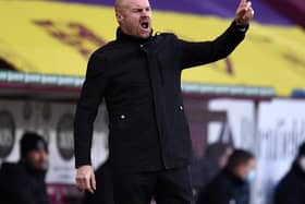 Burnley's English manager Sean Dyche shouts instructions to his players from the touchline during the English Premier League football match between Burnley and Everton at Turf Moor in Burnley, north west England on December 5, 2020.
