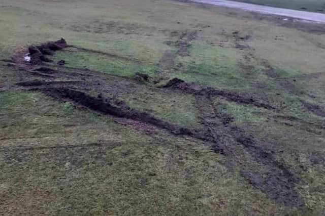 Tyre marks left on the green. Photo by Gary Blades