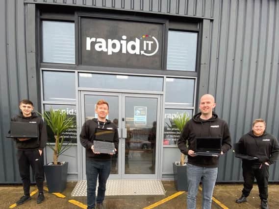 The Rapid IT ready to collect donated devices - Max Dobson, MD Jack Bannister, Chris Stevenson and Reece Lawrence as part of their Tech 4 All Kids campaign.