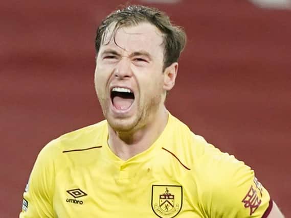 Burnley's English striker Ashley Barnes celebrates scoring the opening goal during the English Premier League football match between Liverpool and Burnley at Anfield in Liverpool, north west England on January 21, 2021.