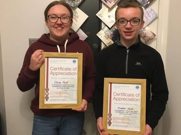 Olivia and Matthew Hurst delighted with the volunteering certificates