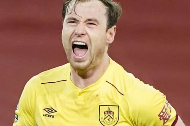 Ashley Barnes celebrates his winner at Anfield