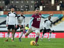 Burnley's English striker Jay Rodriguez takes a penalty kick to score their second goal during the English FA Cup fourth round football match between Fulham and Burnley at Craven Cottage in west London on January 24, 2021.