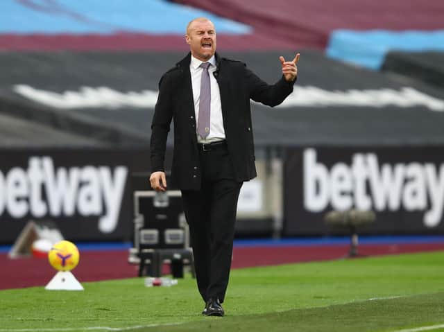 Sean Dyche, Manager of Burnley gives his team instructions during the Premier League match between West Ham United and Burnley at London Stadium on January 16, 2021 in London, England.
