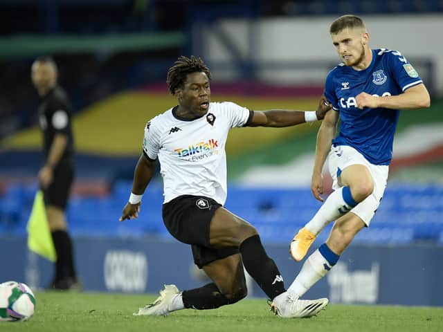 Brandon Thomas-Asante of Salford City fouls Jonjoe Kenny of Everton during the Carabao Cup Second Round match between Everton FC and Salford City at Goodison Park on September 16, 2020 in Liverpool, England.