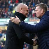 Dean Smith, Manager of Aston Villa shakes hands with Sean Dyche of Burnley prior to the Premier League match between Burnley FC and Aston Villa at Turf Moor on January 01, 2020 in Burnley, United Kingdom.
