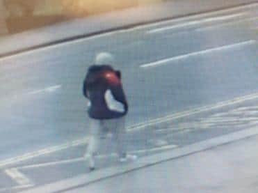 Police hope that although the image is quite blurry someone may recognise this man who is believed to have exposed himself to a teenage girl in Burnley this morning