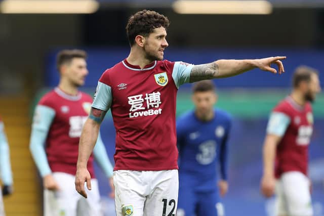 Robbie Brady of Burnley gives instructions during the Premier League match between Chelsea and Burnley at Stamford Bridge on January 31, 2021 in London, England.